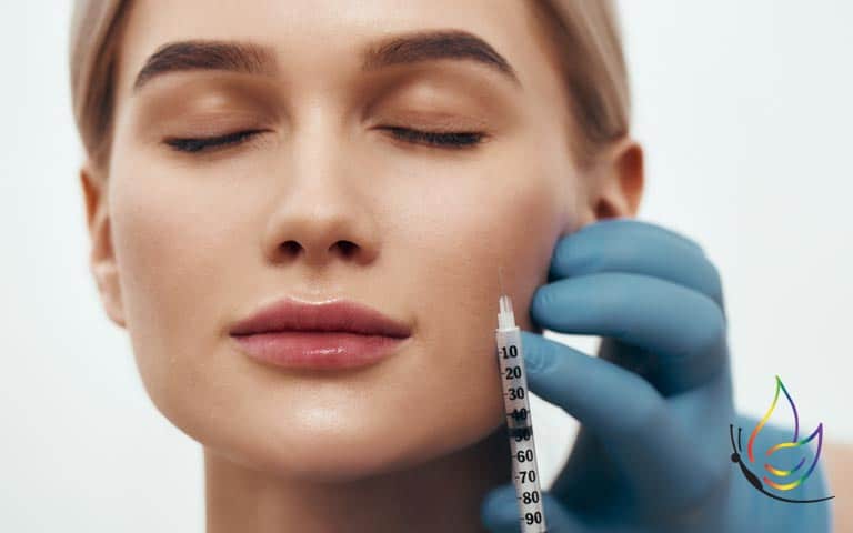 beautiful woman receiving filler injection